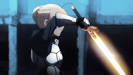 a woman is holding a sword that is glowing in the dark .