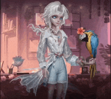 a woman holding a blue and yellow parrot in her hand