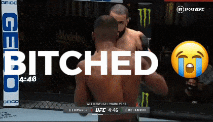 two men are hugging in a boxing ring and the words bitches are on the bottom