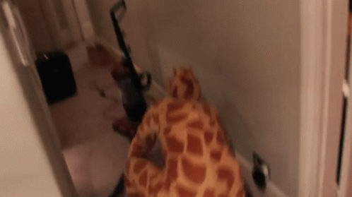 Amazingphil GIF - Giraffe Man Crawiling GIFs