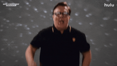 a man wearing glasses and a black shirt with hulu written on the bottom