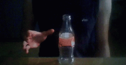 ловит рукой бутылку GIF - Chasing Catching Bottle GIFs