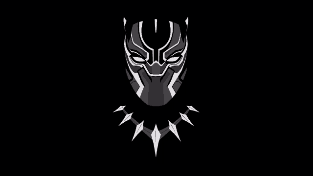 a black panther mask and necklace on a black background