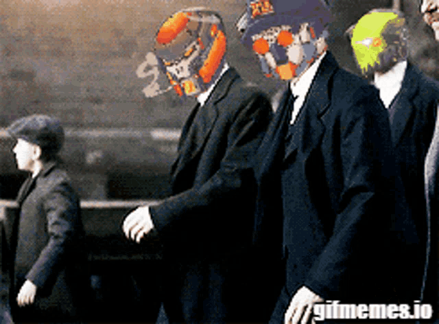 a group of men wearing suits and masks with a gifmemes.io logo on the bottom right