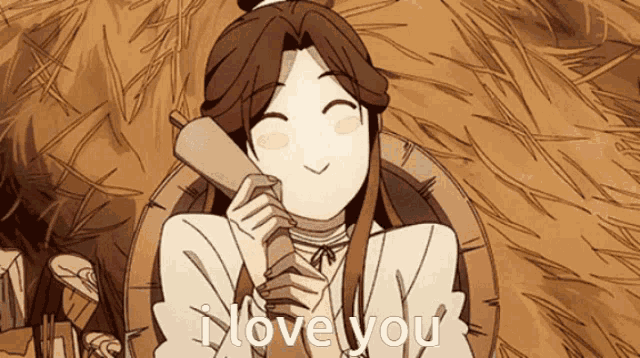a cartoon character says i love you while talking on a cell phone