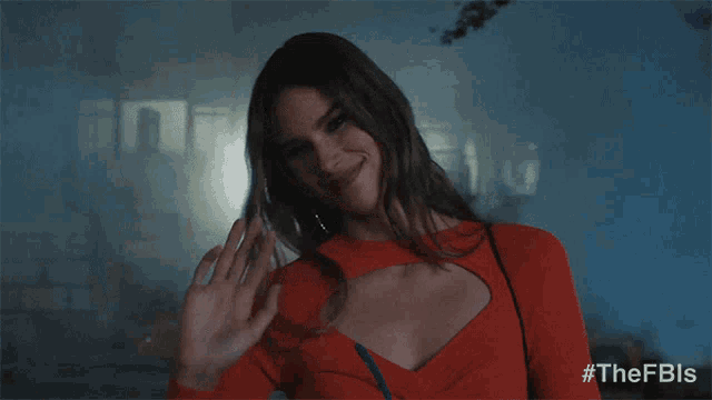 a woman in a red top with the hashtag #thefbs on the bottom