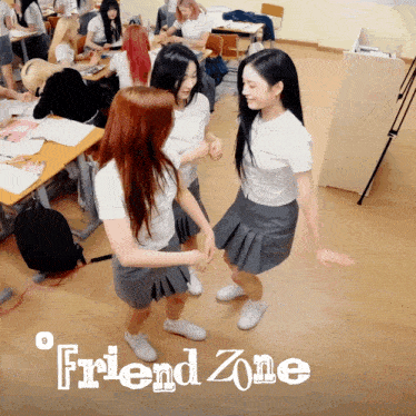 a group of girls are dancing in a classroom with the words friend zone on the bottom right
