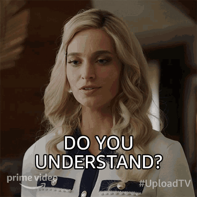 a woman in a white and blue jacket says " do you understand "