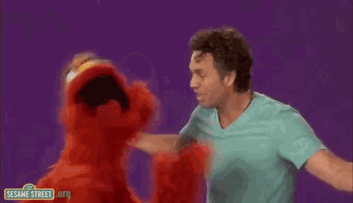 Mark Ruffalo Sesame Street GIF - Mark Ruffalo Sesame Street Dancing GIFs