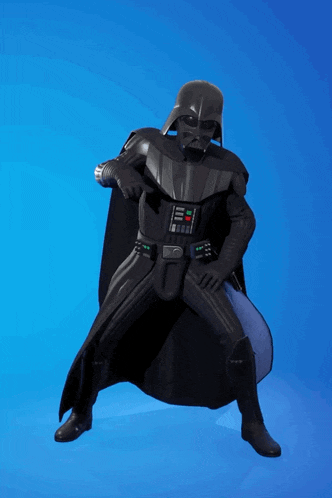 darth vader is wearing a cape and a helmet
