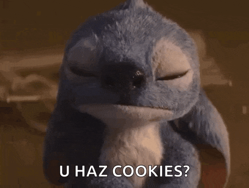 a stuffed animal with its eyes closed is saying `` u haz cookies ? ''