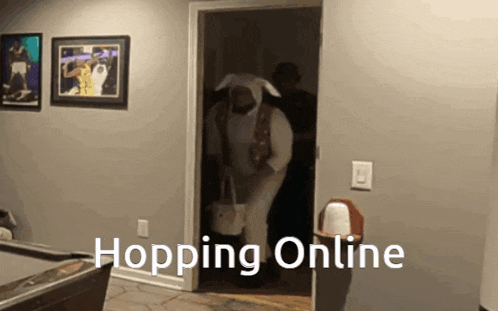 a man in a bunny costume is walking through a door with the words hopping online written on the bottom