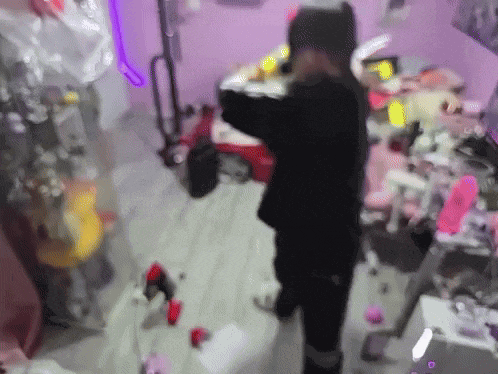 a blurry picture of a person in a room