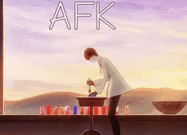 a man standing in front of a table with the word afk written above him