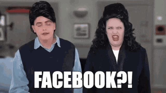 a man and a woman are standing next to each other with the word facebook written on the screen