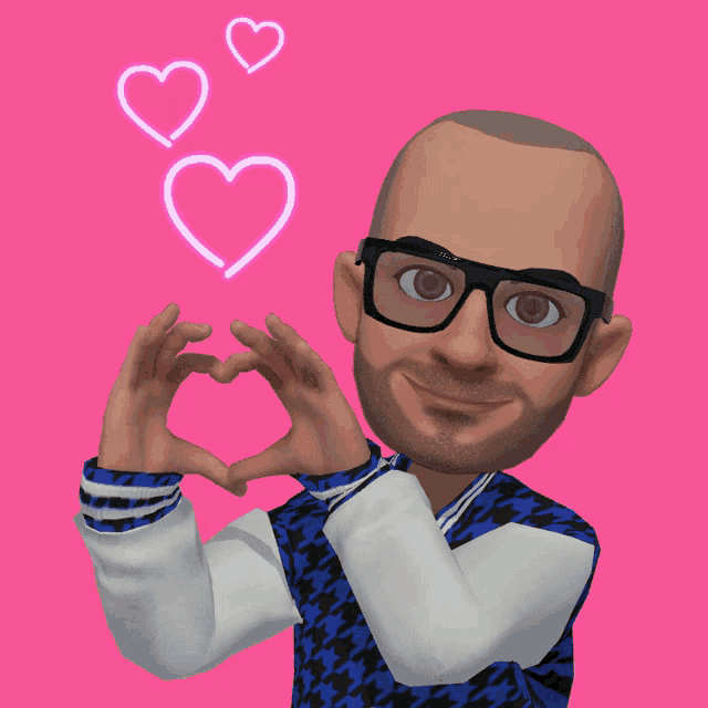 a man making a heart shape with his hands
