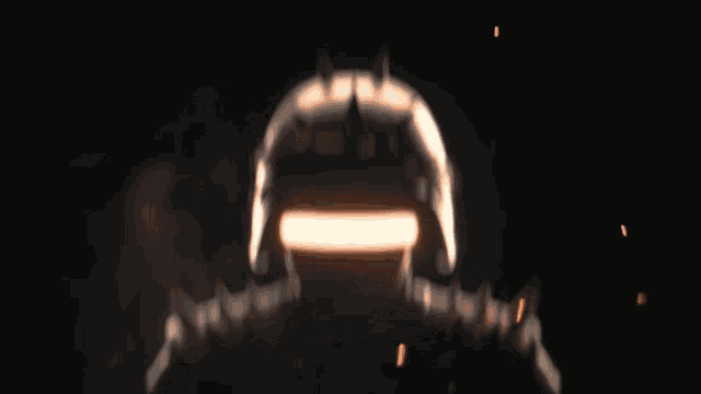 a blurred image of a person 's head with a light coming out of it