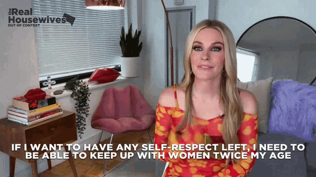 a woman is sitting in a living room with the words real housewives out of context