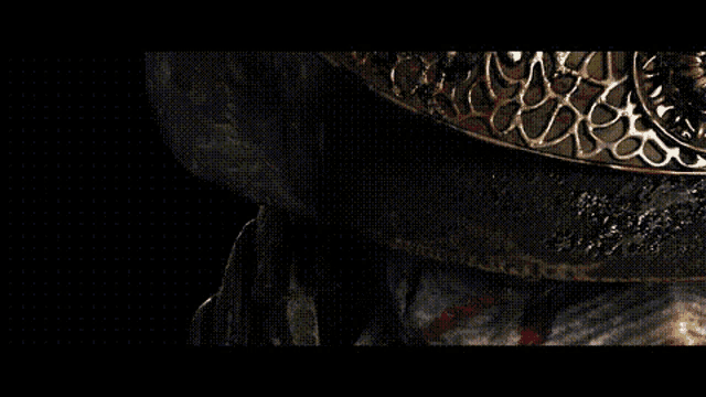 a close up of a person 's face with a red eye