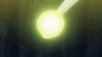 a close up of a yellow light coming out of a hole in the ground .