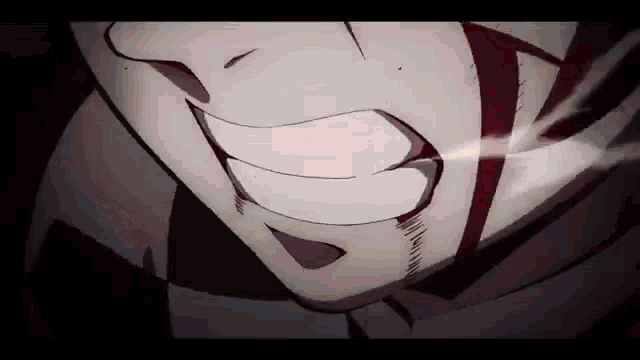 a close up of a person 's face with blood coming out of it and a smile .