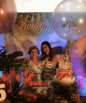a woman is celebrating her 25th birthday with balloons and a cake