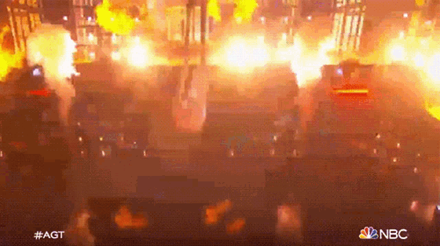 an aerial view of a building on fire with the nbc logo in the corner