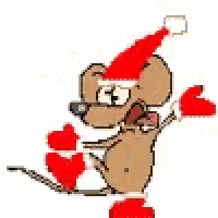a cartoon mouse wearing a santa hat and boxing gloves .