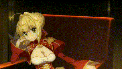 a blonde anime girl is sitting in a red chair .