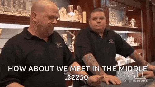 two men are standing next to each other in a store and they are talking about how about we meet in the middle 2250 .
