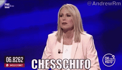 a woman in a pink jacket says chesschifo on a blue screen