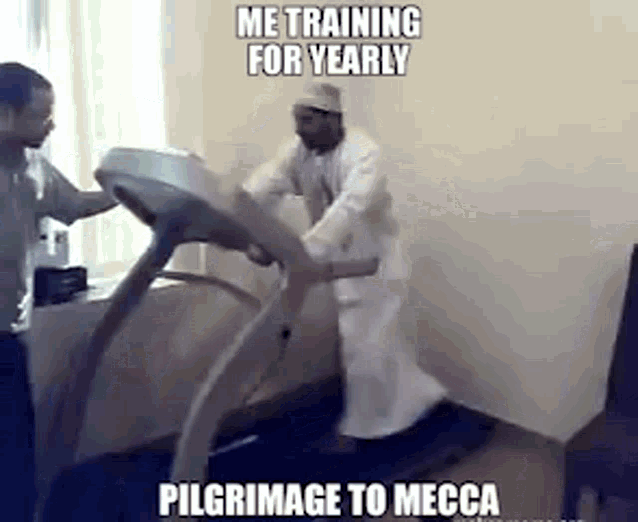 a man is running on a treadmill while another man watches .