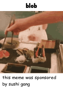 a pig is sitting at a table with chopsticks eating sushi .