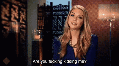 a woman in a blue dress is asking if someone is kidding her .
