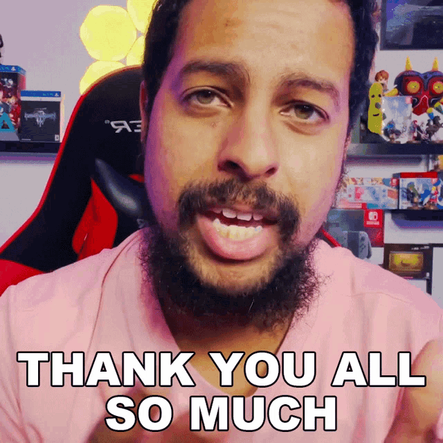 a man says thank you all so much in a pink shirt