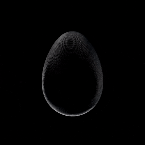 a black egg on a black background looks like a sphere