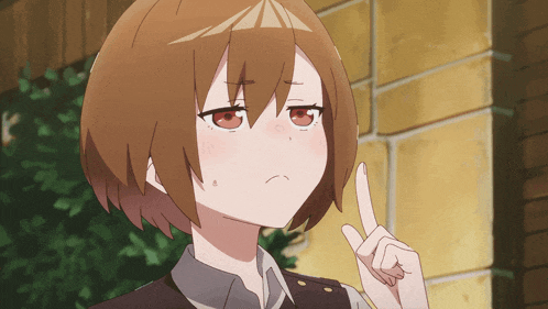 a girl with brown hair and red eyes is making a funny face with her finger up