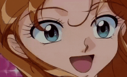 a close up of a girl 's face with long hair