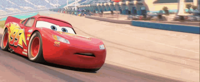 a red race car with the number 95 on it