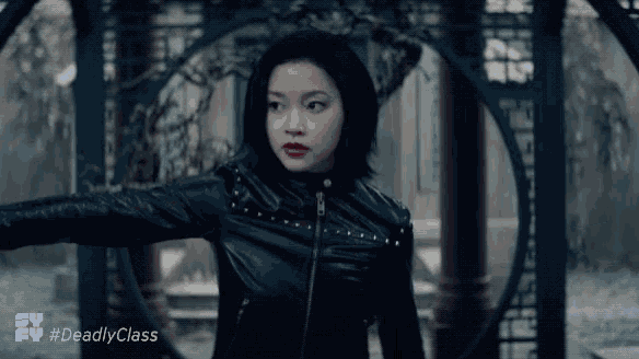 a woman in a black leather jacket with the hashtag #deadlyclass on the bottom left
