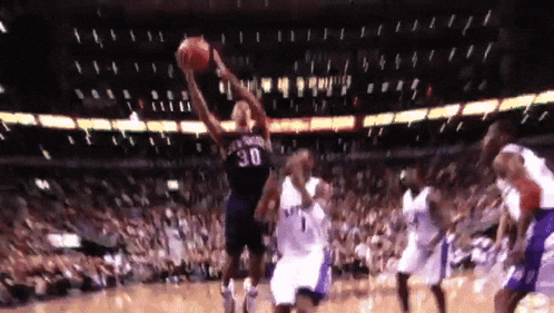 a basketball player with the number 30 on his back
