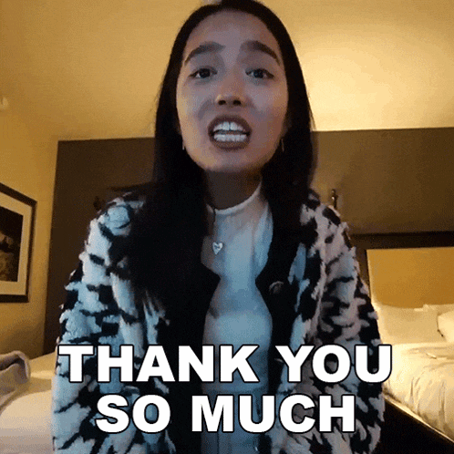 a woman says " thank you so much " in a hotel room