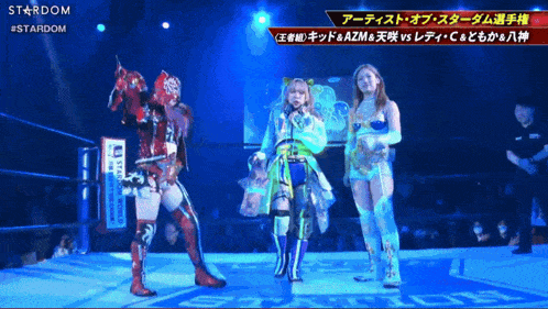three women are standing on a stage with the word stardom on the bottom