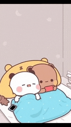 two cartoon bears are laying on a bed .