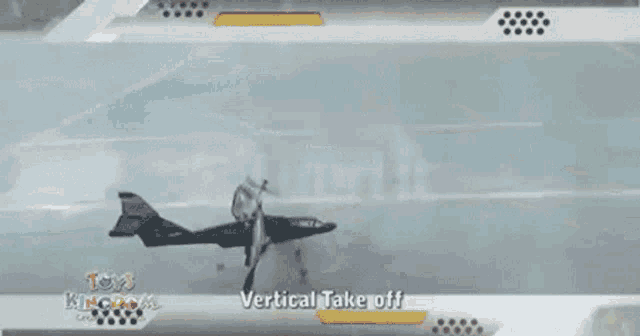 a video shows a vertical take off with toys kingdom in the background