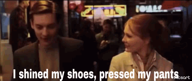 a man and a woman standing next to each other with the words i shined my shoes pressed my pants