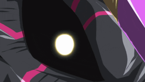 a close up of a person 's eye with a yellow light