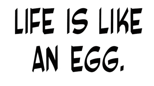 a sign that says life is like an egg on it