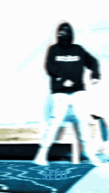 a blurry picture of a person with the word sefu written on the bottom