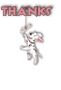 a dalmatian dog is jumping to catch a bone that is hanging from a string